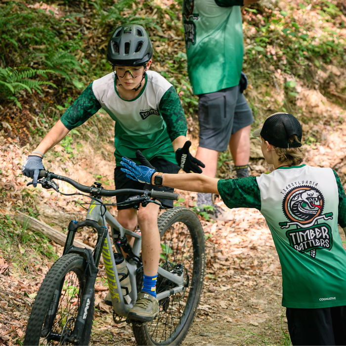 Youth riders in Cognative jerseys